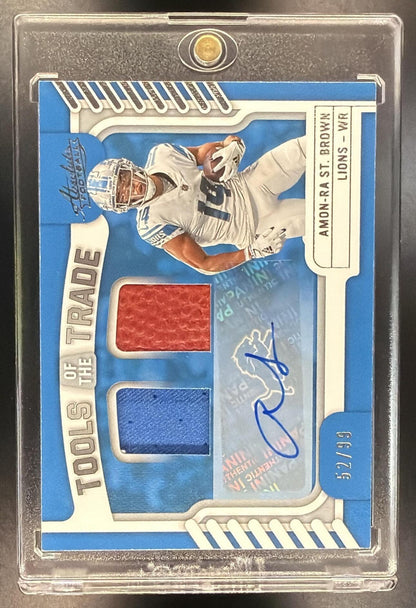 2022 Panini Absolute Amon-Ra St. Brown #TTD-40 Tools of the Trade Materials Double Autos /99 MEM Auto