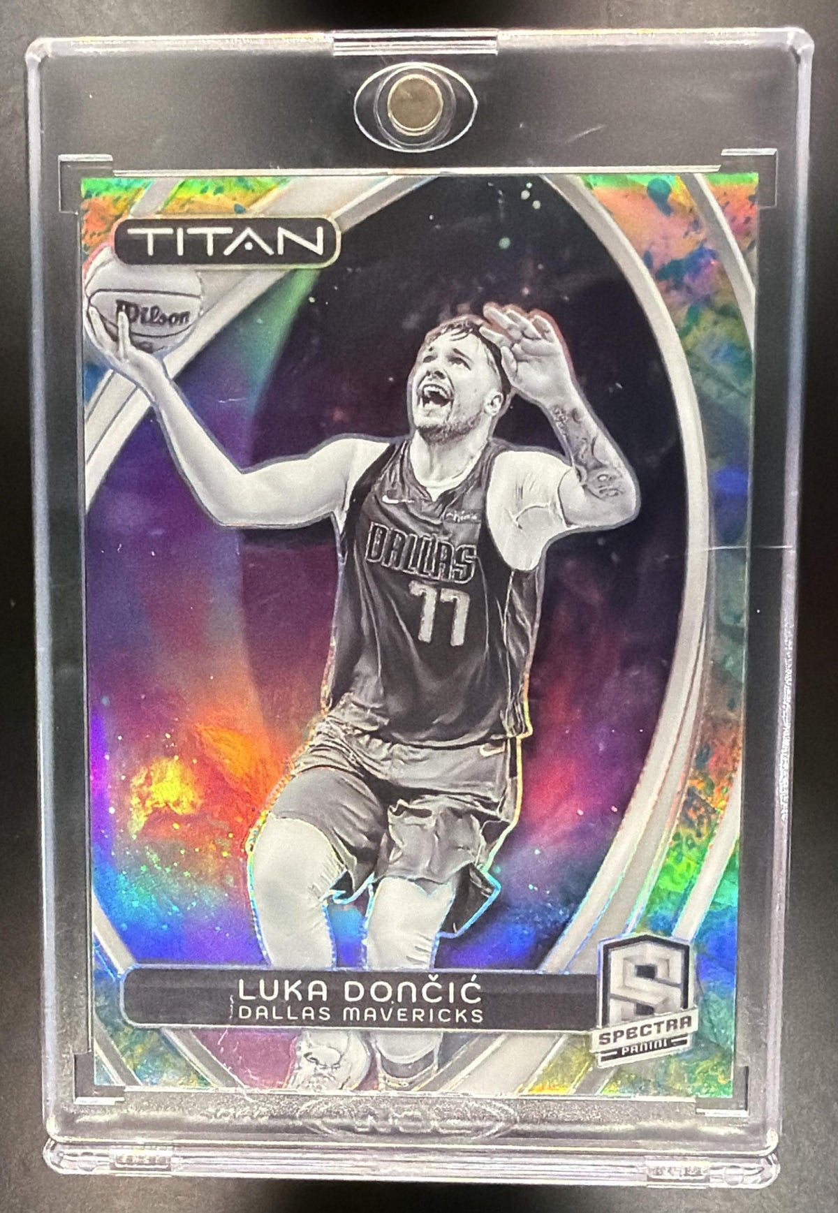 2023-24 Panini Spectra Luka Doncic #58 Titan International Neon Splatter /8